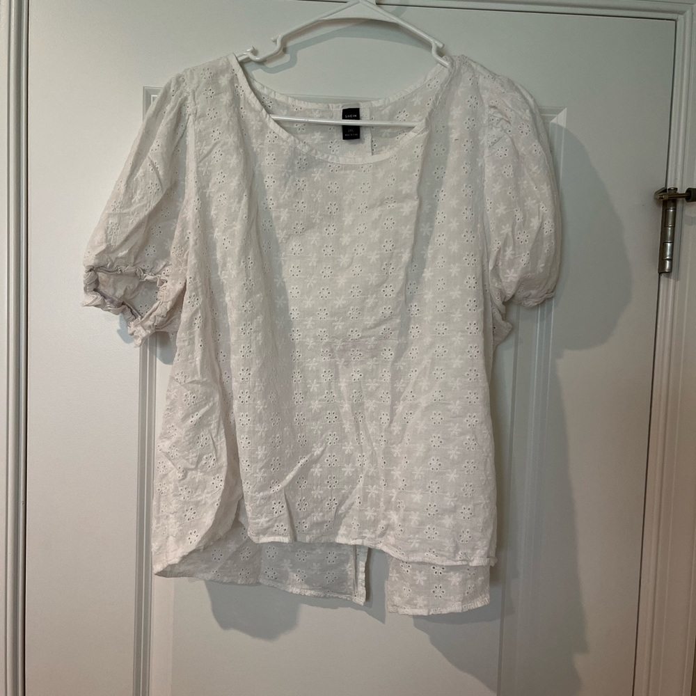 SHEIN white shirt with buttons up the back. Size 3XL.